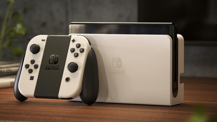 Nintendo Switch Oled White Console Bianca +Super Mario Wonder + 12 Mesi Abbonam.